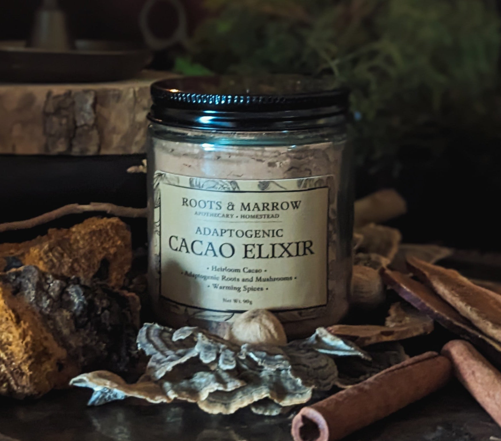 Jar of 'Adaptogenic Cacao Elixir' by Roots & Marrow on a rustic background with herbs and spices.