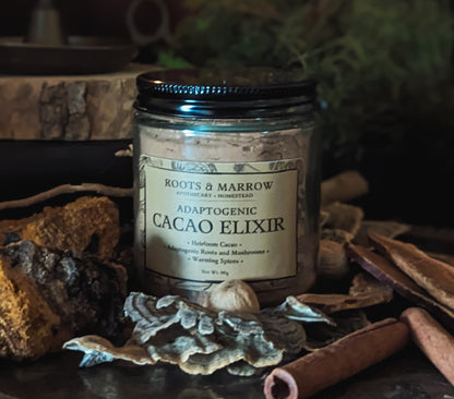 Jar of 'Adaptogenic Cacao Elixir' by Roots & Marrow on a rustic background with herbs and spices.